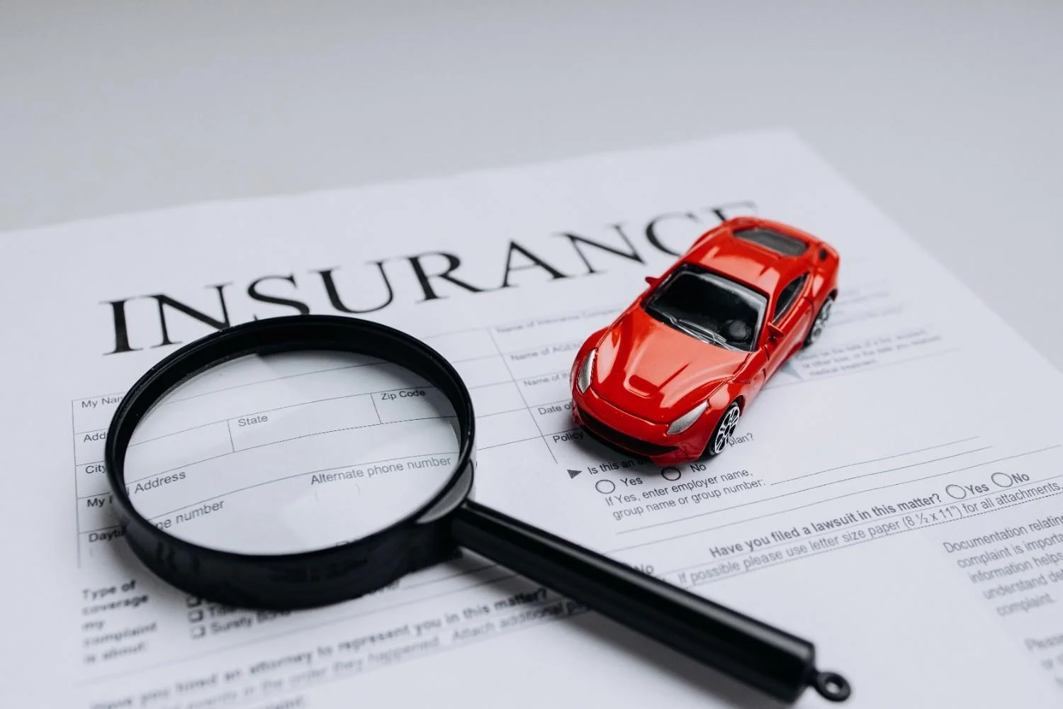 Person reading insurance documents